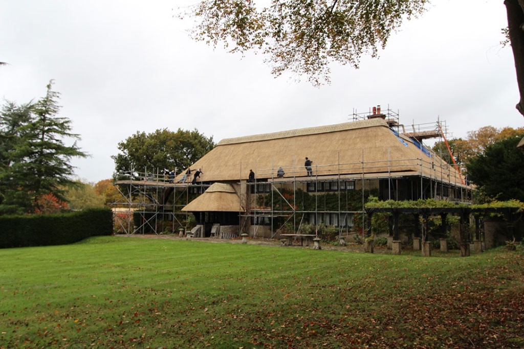 Latchmoor House, New Forest, Hampshire during re-thatching works by Tom Whiteley Thatching